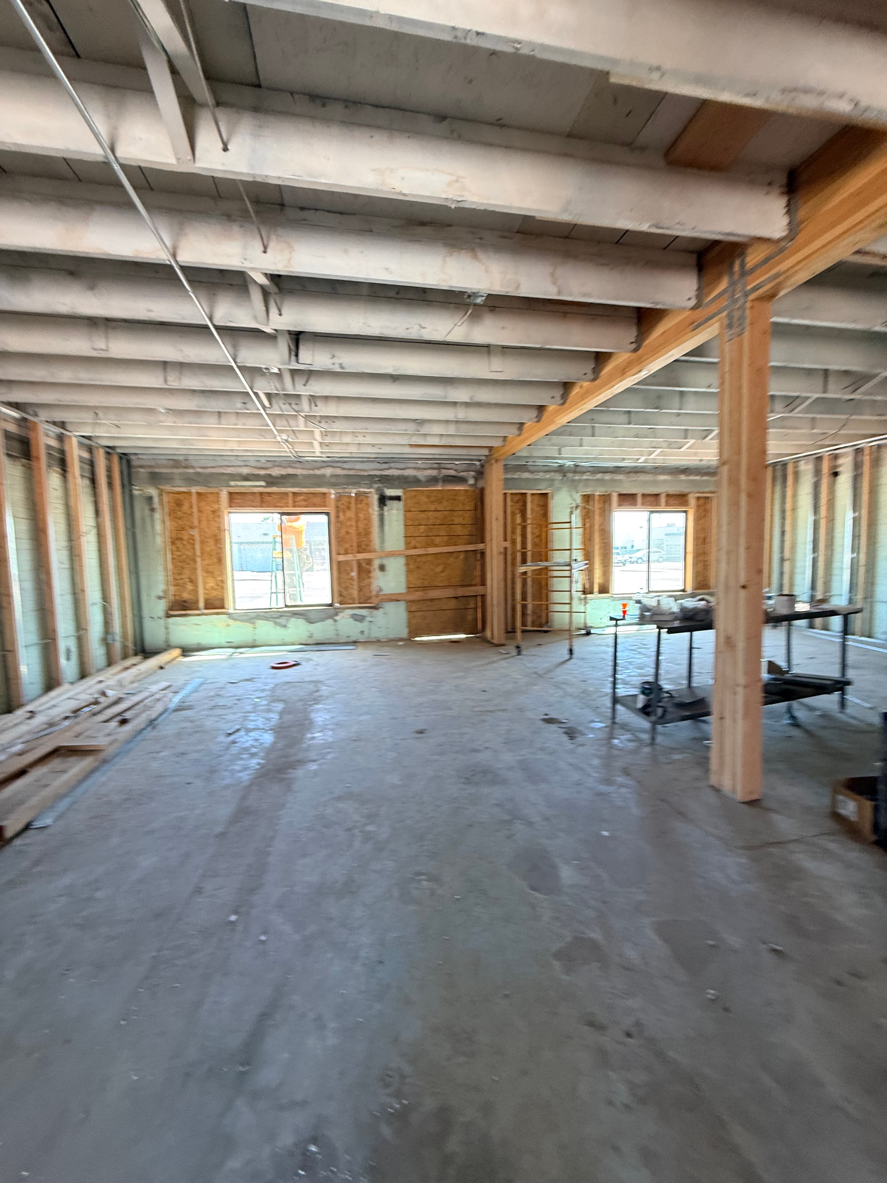 Interior construction framing and concrete walls during restoration