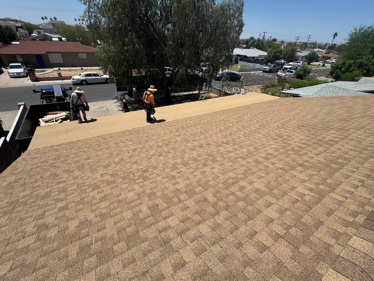 Roofers installing shingle roof — RMSERVCORP residential roofing