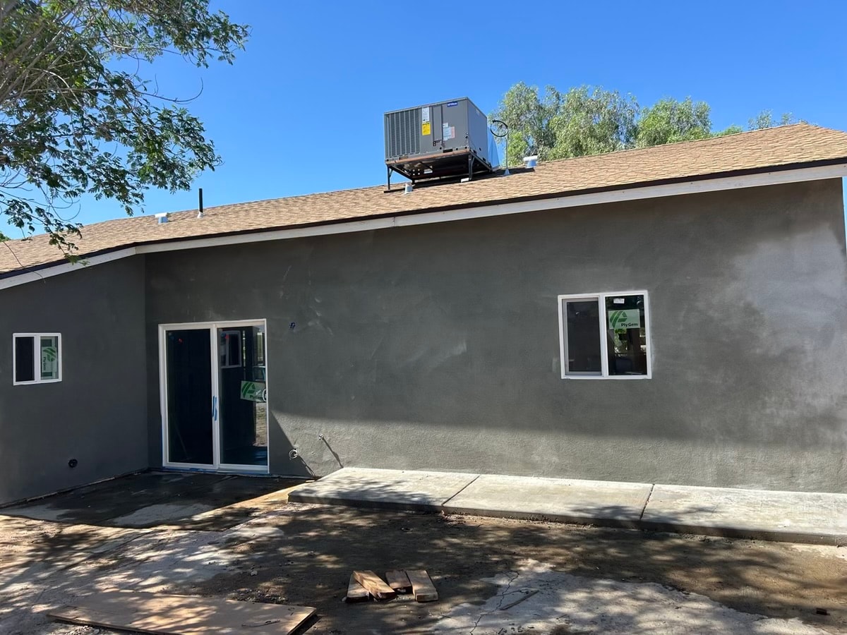 Modern house with rooftop HVAC unit — RMSERVCORP renovation